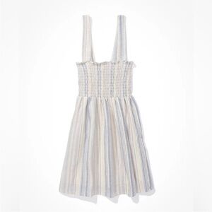 American Eagle outfitters smocked mini dress with a crisscross back. Size small.